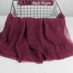 Solid color lightweight breathable cotton linen scarf with ruffles and fringed edge detail.