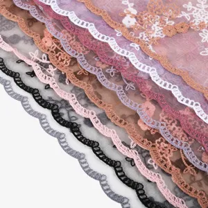 Detailed view of multi-color vintage lace headscarf with exquisite embroidered scalloped edges.