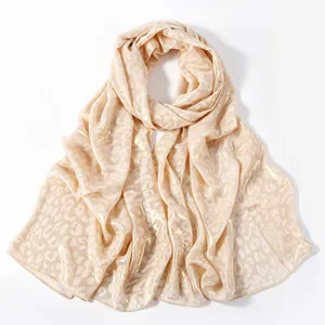 Chic leopard print chiffon long scarf with gold foil details, elegant drape and soft feel.