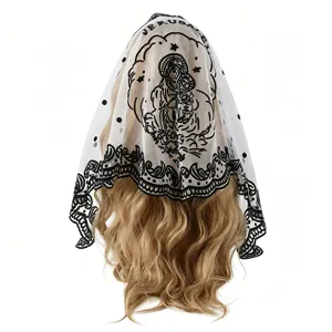 Detail view of the black and white lace veil featuring religious pattern for unique styling.