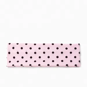 Bandeaux élastiques larges à pois roses vue principale avec un style de tissu à plat.