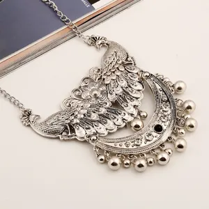 Vintage silver peacock rhinestone pendant necklace detailed view with exquisite carving design.
