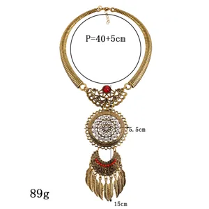 Vintage goldfarbene Statement Halskette mit roten Steinen Strass und Blatt Quasten Damen.