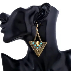Vintage boho geometric triangle alloy dangle earrings with turquoise beads for women daily wear.