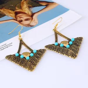 Retro alloy triangle earrings with blue beads, vintage carved ethnic drop jewelry.