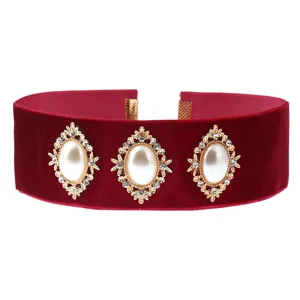 Vintage red velvet choker necklace with ornate pearl rhinestone details for women chic style.
