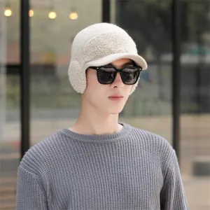 Close-up detail of winter knitted earflap hat, showing soft fleece texture and warm design style.