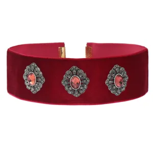 Red velvet choker necklace with vintage style rhinestone red crystal gemstone details.