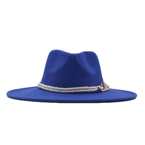 Close-up detail view of blue wool fedora hat with elegant rope band and metal side decor.