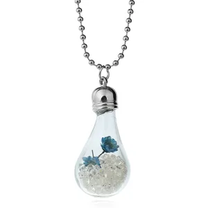 Close-up detail of the glass bottle pendant necklace featuring blue dried flowers inside.