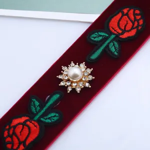 Vintage red velvet choker necklace featuring exquisite rose embroidery and pearl rhinestone decor.