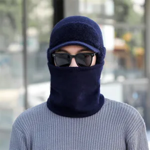 Detailed view of men's winter knitted balaclava hat with thick fleece and warm neck cover.