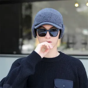 Winter men knitted hat detail view, thick fleece warm earflap beanie, stylish cold-weather gray cap.