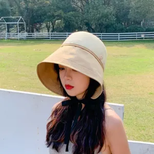 Stylish women color block sun bucket hat with chin strap, perfect for outdoor beach and summer.