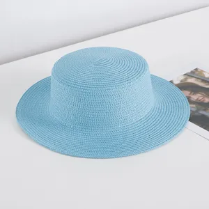 Light blue flat-top straw hat detail, summer beach sun protection sunhat, stylish casual design.