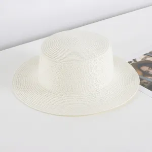 Women white flat top straw hat for summer beach vacation, stylish sun protection woven sunhat.