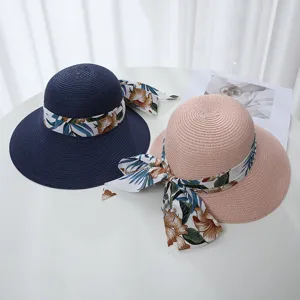 Damen Strohhut mit breiter Krempe und Blumenband Schleife fuer Sommer Strand und Sonnenschutz.