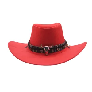 Red western cowboy hat close-up showcasing ethnic patterned band and bull skull metal decor.