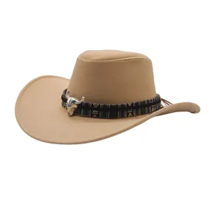 Western cowboy hat detail featuring a stylish bull skull metal ornament and woven tribal band.
