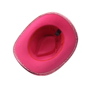Close-up detail of hot pink glitter cowboy hat, perfect for party performances and festivals.