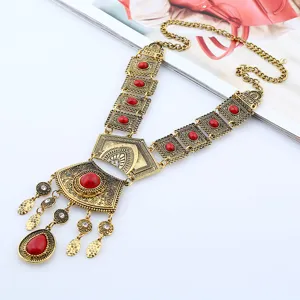 Collana girocollo dorata vintage con pietre rosse gioielli etnici con nappe chic