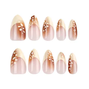 Brown gradient French press-on nails, almond shape with cute white dots for daily chic wear.