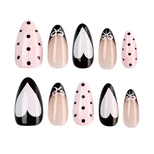 Almond press-on nails with black polka dots, white hearts and cute bows for women.
