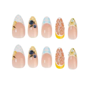 Short almond press-on nails featuring 3D fruit designs like blueberries, lemons, and cute lace.