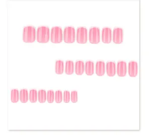 Close-up of short square French gradient nail tips detail view, pink and white design.