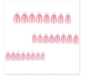 Short almond press-on nails detail view, elegant French light pink style with white tips.