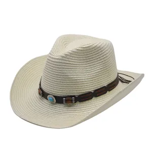 Detailed view of the woven straw cowboy hat with beaded leather band for summer outdoor sun.