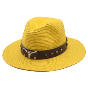 Unisex summer straw sun hat with leather band and metal bull decor for outdoor beach use.