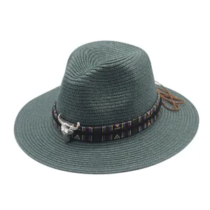 Green straw hat with tribal band and bull skull decor, perfect for summer beach sun protection.