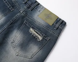 Pantaloncini jeans uomo blu strappati streetwear dettaglio estate moda tendenza casual