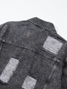 Back detail view of men's acid wash distressed denim jacket, showcasing ripped texture.