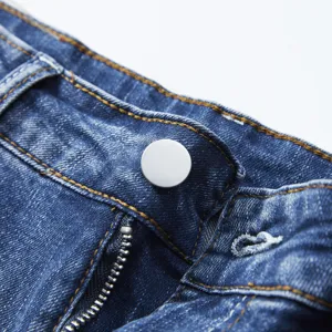 Close-up detail view of men's classic denim shorts waistband, button and zipper.