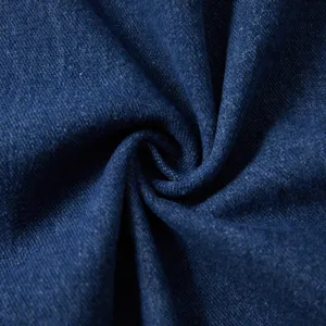 Close-up view of premium dark blue denim fabric with clear texture, ideal for apparel details.