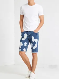 Shorts in denim elasticizzato lavato uomo bermuda casual estivo con design gocce di vernice.
