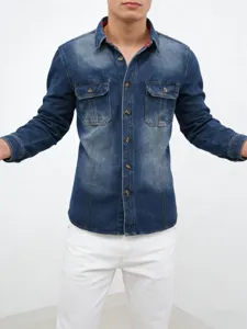 Men's washed blue denim long sleeve shirt with double chest pockets and classic lapel design