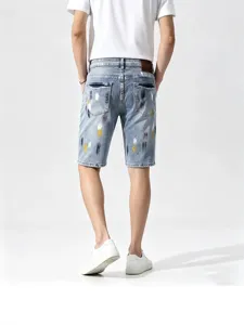 Uomo estate azzurro chiaro stampa schizzi elasticizzato jeans pantaloncini casual lunghi