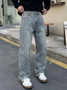Men's loose straight fit washed denim jeans trousers with allover pattern detail streetwear.