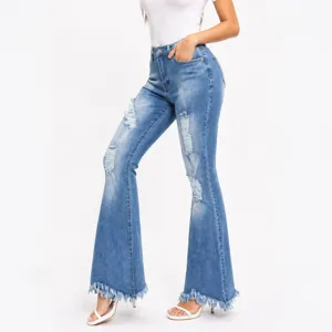 Women distressed high waist flare jeans denim pants with ripped details and raw hems.