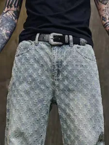 American streetwear loose straight washed distressed denim jeans with vintage metal belt.