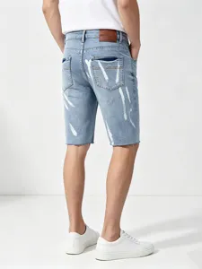 Pantaloncini di jeans elasticizzati da uomo con design di schizzi di pittura alla moda.