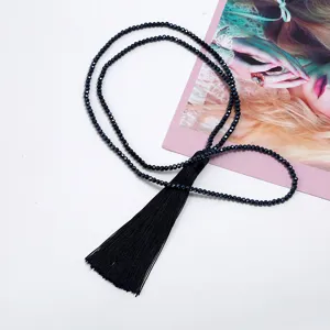 Black crystal beaded long sweater chain with tassel for women fashion jewelry accessory.