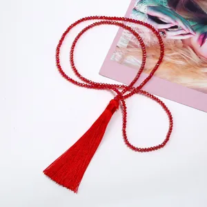 Red crystal beaded long tassel necklace detail view, elegant red sweater chain jewelry.