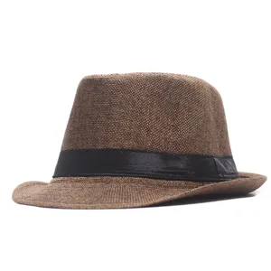 Classic brown fedora hat for men and women, stylish straw sun hat with black band for outdoor wear.