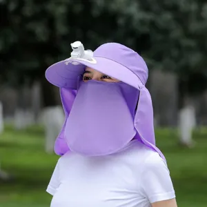Detail view of the purple sun protection hat with built-in fan and full face shield.