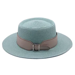 Detail view of a stylish women flat-top straw hat with belt decor, ideal for summer beach.