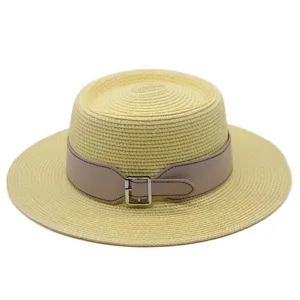 Lightweight straw flat top hat with stylish leather belt and metal buckle for women.